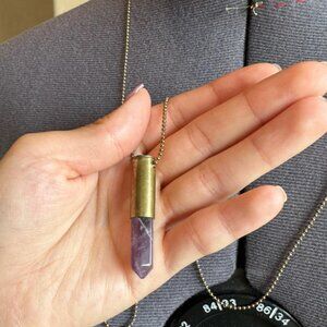 Purple amethyst pendant necklace on long gold chain